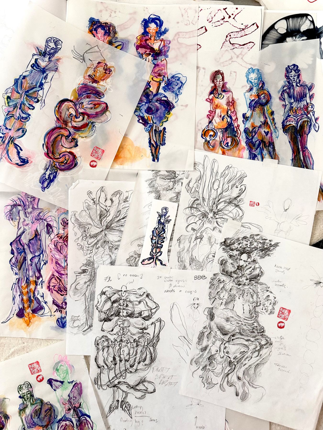 A wall of Ianna's color figure drawings