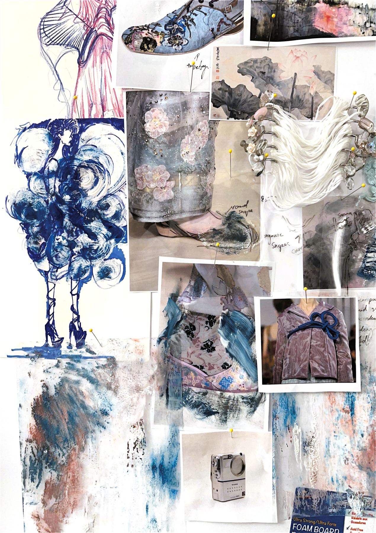 Collage wall of sketches, photographs and a blue figure drawing